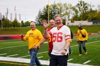 University of Guelph alumni walking off the football field