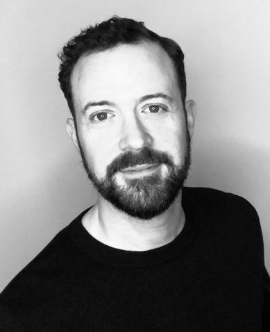 Black and white photo of a man.