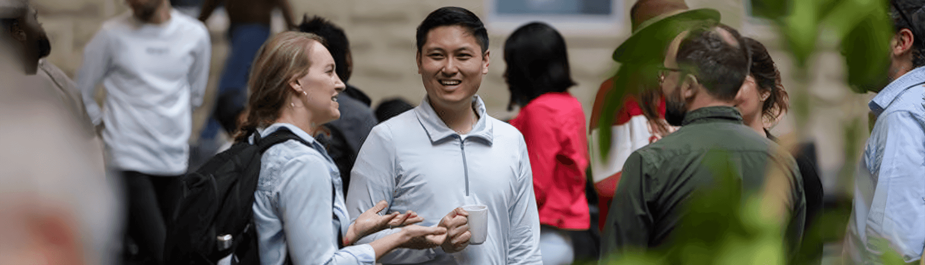 People attending a networking event and talking.